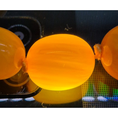 100 - Vintage Amber Egg Yolk Graduated Beads.