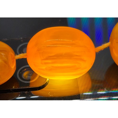 100 - Vintage Amber Egg Yolk Graduated Beads.
