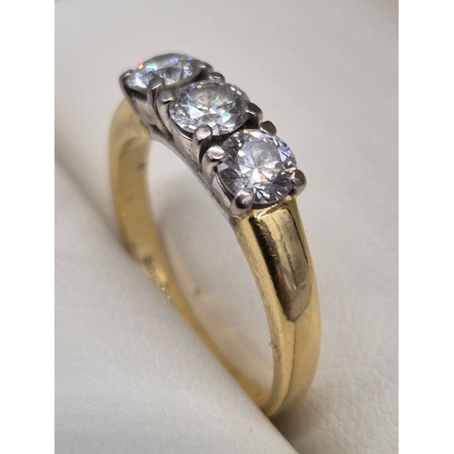 61 - 18ct yellow gold three diamond ring. 0.75cts. 
3.51grams. Ring size K.