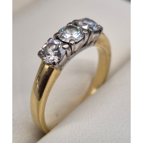 61 - 18ct yellow gold three diamond ring. 0.75cts. 
3.51grams. Ring size K.