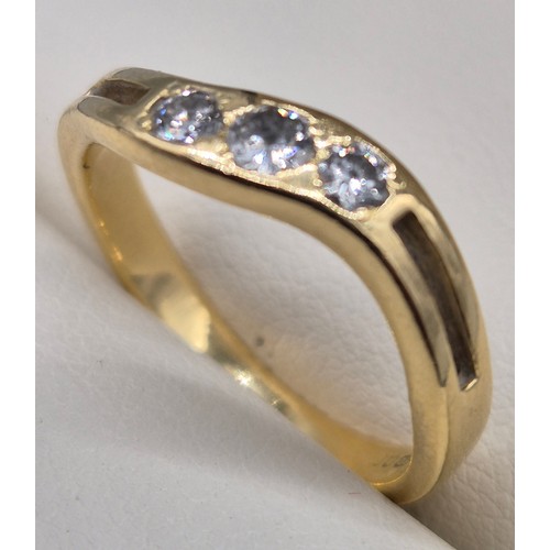 63 - 18ct yellow gold, three diamond stone ring. 
0.30cts. Ring size L. 
3.19GRAMS.