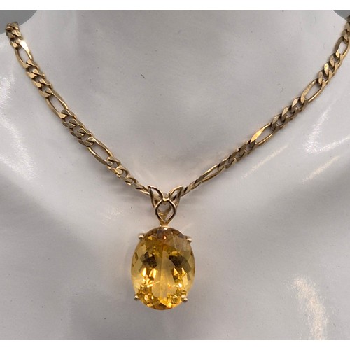 75 - 9ct yellow gold curb chain together with a 10ct yellow gold and oval cut Citrine Gem Stone Pendant. ... 