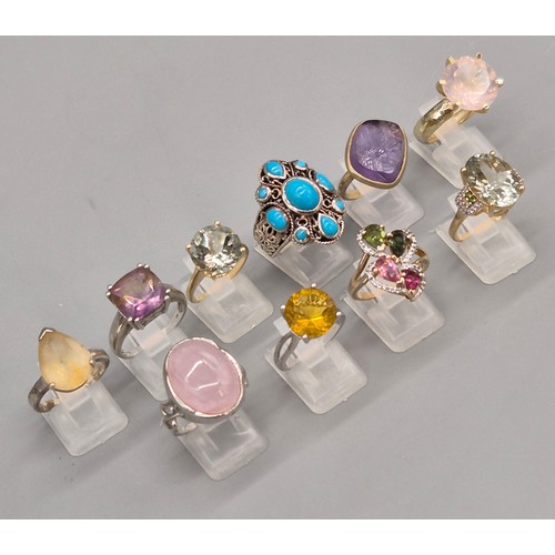 72 - A Collection of 10 Silver and Gem stone rings; Pink Quartz, Amethyst, Quartz and blue stone rings.