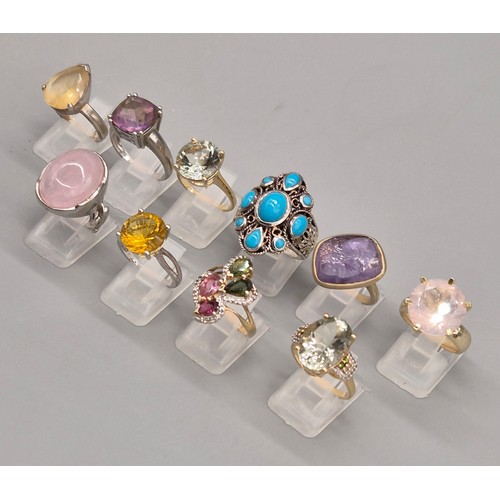 72 - A Collection of 10 Silver and Gem stone rings; Pink Quartz, Amethyst, Quartz and blue stone rings.