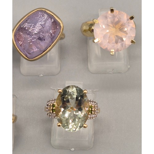 72 - A Collection of 10 Silver and Gem stone rings; Pink Quartz, Amethyst, Quartz and blue stone rings.