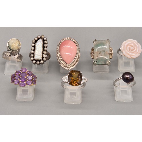 79 - A Collection of eight silver and gem stone rings; Pink Quartz, Pearl, Agate and Amethyst stones.