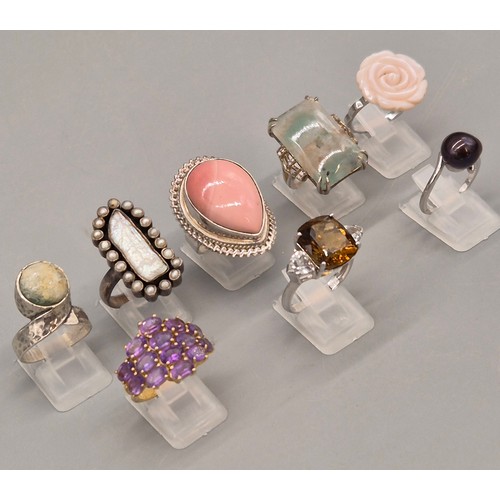 79 - A Collection of eight silver and gem stone rings; Pink Quartz, Pearl, Agate and Amethyst stones.