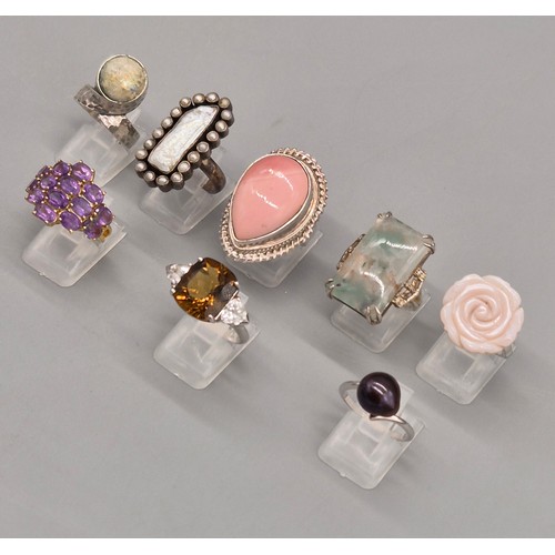 79 - A Collection of eight silver and gem stone rings; Pink Quartz, Pearl, Agate and Amethyst stones.