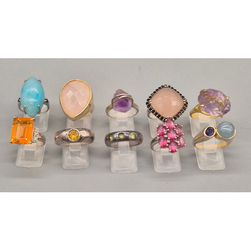 74 - A Collection of 10 Silver and Gem stone rings; Pink and Blue Quartz stones.
