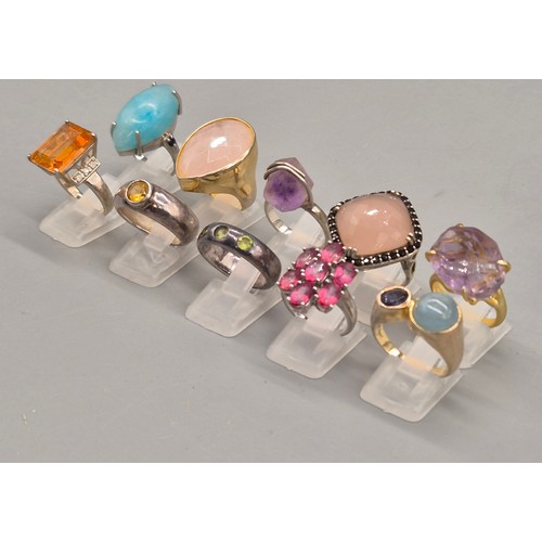74 - A Collection of 10 Silver and Gem stone rings; Pink and Blue Quartz stones.