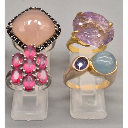 74 - A Collection of 10 Silver and Gem stone rings; Pink and Blue Quartz stones.
