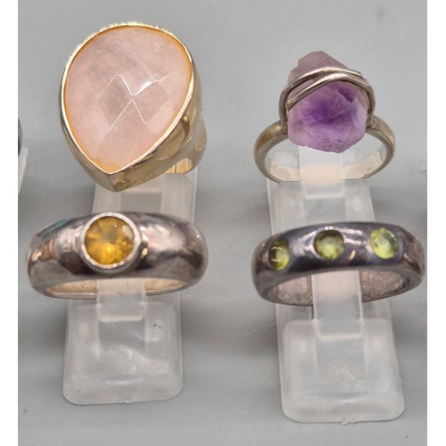 74 - A Collection of 10 Silver and Gem stone rings; Pink and Blue Quartz stones.