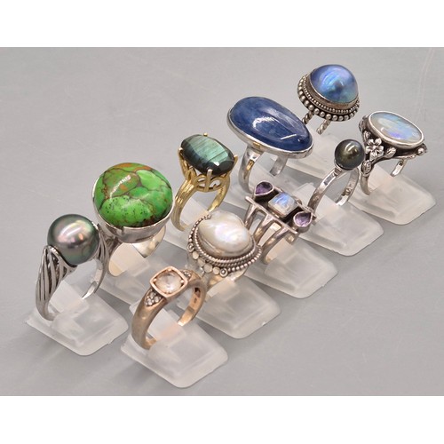 71 - A Collection of 10 Silver and Gem stone rings; Black pearl, Green hardstone, Opal and floral design,... 