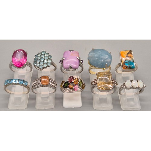 73 - A Collection of 10 Silver and Gem stone rings; Opal Three Stone Ring. Blue and Pink Quartz Stone Rin... 