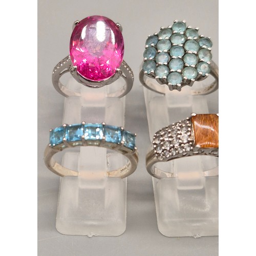 73 - A Collection of 10 Silver and Gem stone rings; Opal Three Stone Ring. Blue and Pink Quartz Stone Rin... 