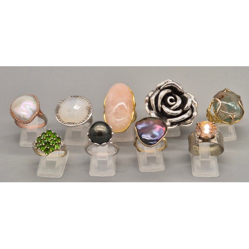 78 - A Collection of eight silver and gem stone rings; Statement silver floral ring. Silver and pink quar... 