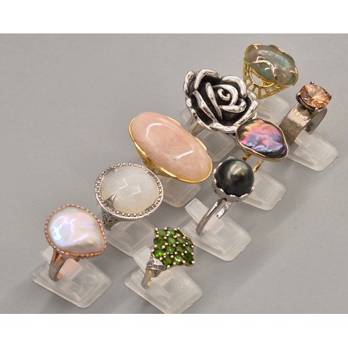 78 - A Collection of eight silver and gem stone rings; Statement silver floral ring. Silver and pink quar... 