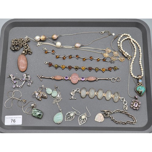 76 - A collection of silver jewellery; Silver and amber bracelets. Silver bracelet with t- bar and heart ... 