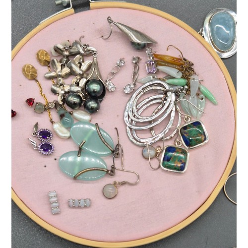 80 - A Collection of silver jewellery; Silver and gem stone pendant, earrings and bracelets. Silver egg s... 
