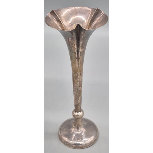 94 - A Pair of Weighted Chester Silver fluted bud vases. Produced by William Neale. 25.5cm high.