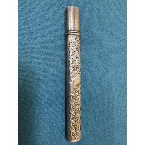102A - Three Silver items; Birmingham silver needle holder. 830 silver pencil and London Silver revolving p... 