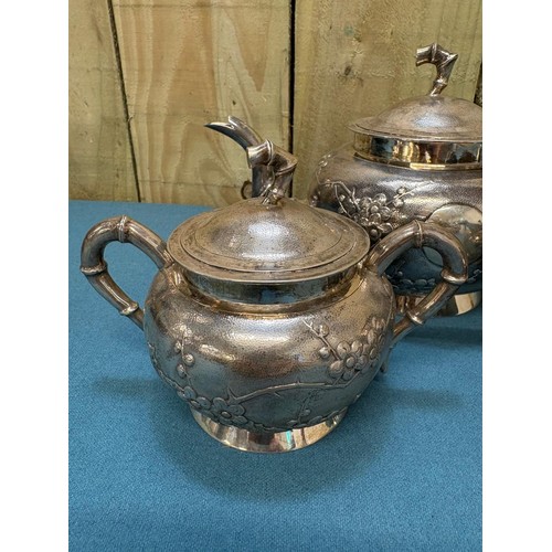 111 - Chinese Silver three piece tea set; Produced by Tuck Chang. Maker mark to the base. Raised relief Bl... 