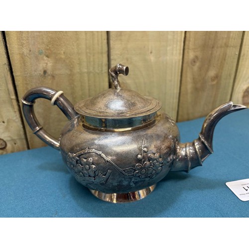 111 - Chinese Silver three piece tea set; Produced by Tuck Chang. Maker mark to the base. Raised relief Bl... 
