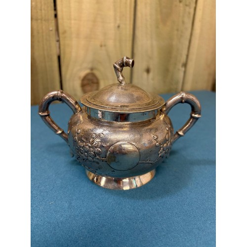 111 - Chinese Silver three piece tea set; Produced by Tuck Chang. Maker mark to the base. Raised relief Bl... 
