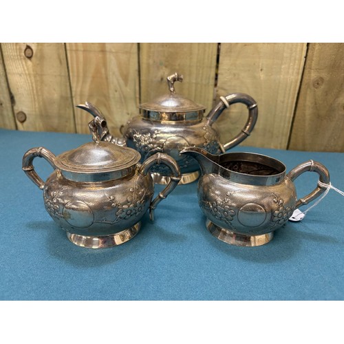 111 - Chinese Silver three piece tea set; Produced by Tuck Chang. Maker mark to the base. Raised relief Bl... 