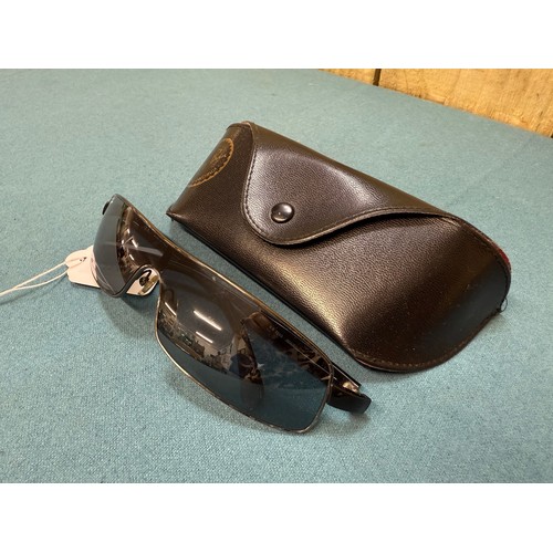 105A - A Vintage pair of Ray Ban Sunglasses. Comes with protective case.