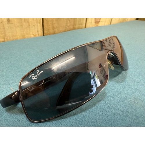 105A - A Vintage pair of Ray Ban Sunglasses. Comes with protective case.