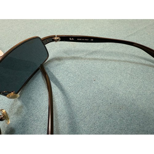 105A - A Vintage pair of Ray Ban Sunglasses. Comes with protective case.