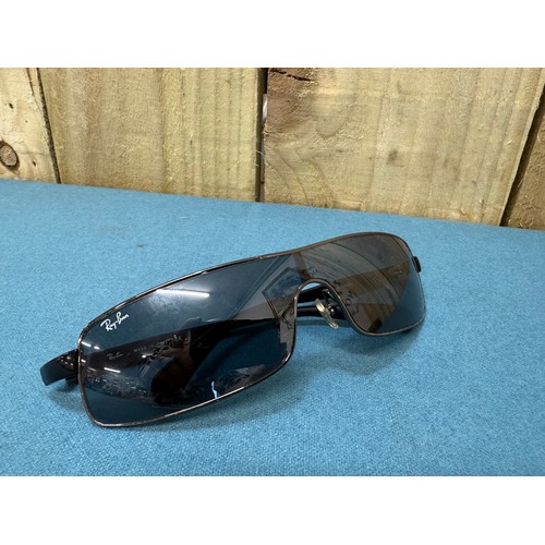 105A - A Vintage pair of Ray Ban Sunglasses. Comes with protective case.