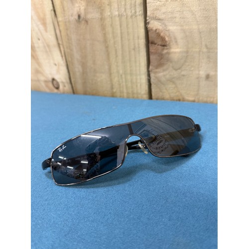 105A - A Vintage pair of Ray Ban Sunglasses. Comes with protective case.