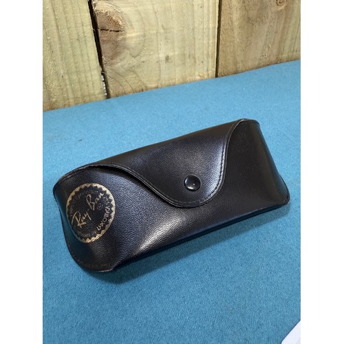 105A - A Vintage pair of Ray Ban Sunglasses. Comes with protective case.