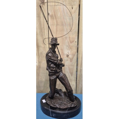 250 - Bronze Fisherman Sculpture Raised on a marble base. 24cm high- measured to hat.
