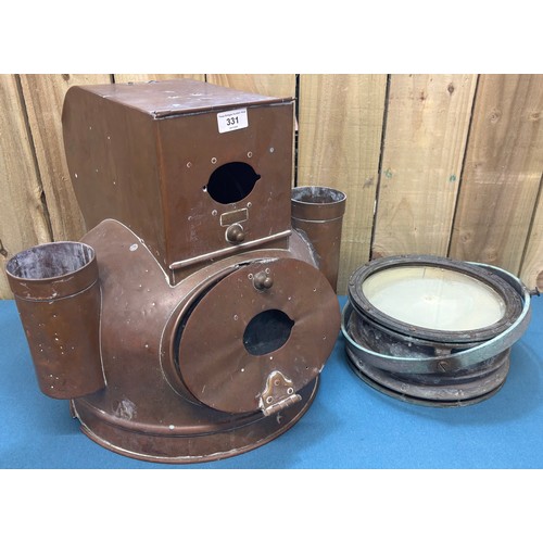 331 - Large British reflecting compass together with a copper compass housing.