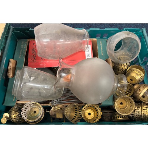 502 - Three Crates  & Two boxes of Oil lamps funnels, Brass fittings & other items.