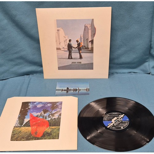 597 - A Bundle of records to include 1st pressing of Pink Floyd wish you were here album A1/ B3, also incl... 
