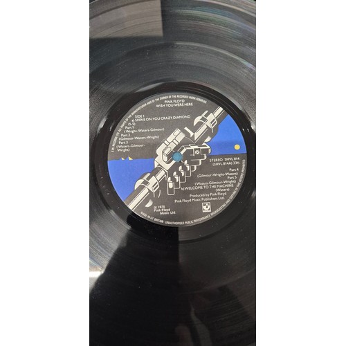 597 - A Bundle of records to include 1st pressing of Pink Floyd wish you were here album A1/ B3, also incl... 