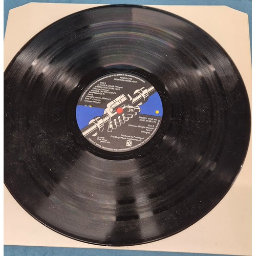 597 - A Bundle of records to include 1st pressing of Pink Floyd wish you were here album A1/ B3, also incl... 