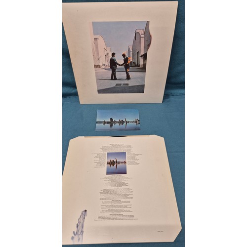 597 - A Bundle of records to include 1st pressing of Pink Floyd wish you were here album A1/ B3, also incl... 