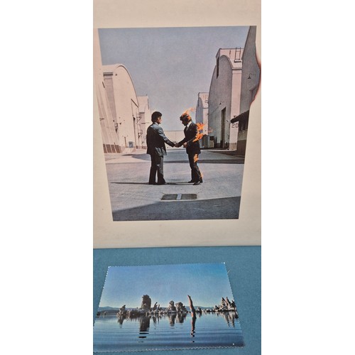 597 - A Bundle of records to include 1st pressing of Pink Floyd wish you were here album A1/ B3, also incl... 