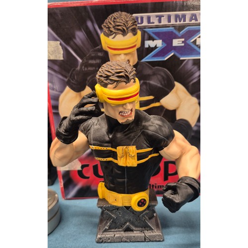 575 - Three X-Men statues; Ultimate X-Men Cyclops Ultimate Bust with box and X-Men Cyclops mini statues tw... 