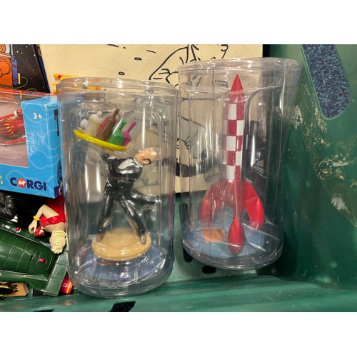 591 - A Crate of Tin Tin Collectables and odds; Card deck containing mixed collectors cards- Simpsons, Sta... 