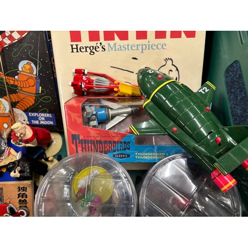 591 - A Crate of Tin Tin Collectables and odds; Card deck containing mixed collectors cards- Simpsons, Sta... 