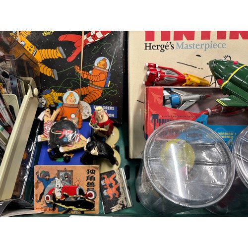 591 - A Crate of Tin Tin Collectables and odds; Card deck containing mixed collectors cards- Simpsons, Sta... 
