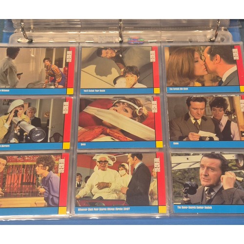585 - Four various trading card binders; Planet of the Apes card collection with signed autograph cards, U... 