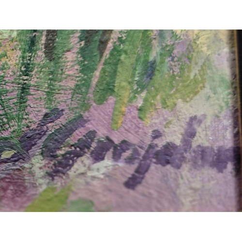 220 - Oil on canvas depicting a cottage garden. Signed to lower right hand corner. Frame- 55x75cm.