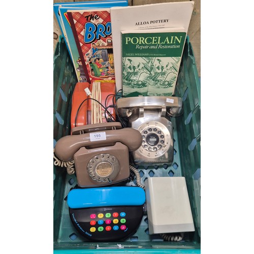 195 - Four vintage dial phones and push button phones. Also includes Dandy books.